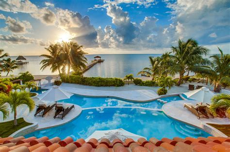 Belize ambergris caye real estate  There is the on-site restaurant, pool bar, three swimming pools, on-site property management